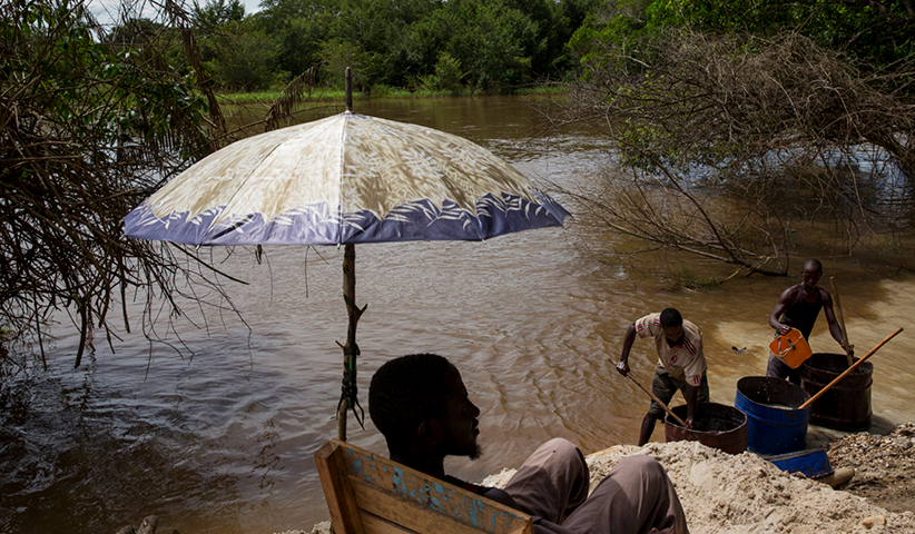Workers searching for diamonds in the river Kotto, an area in the east of the country which is still in the hands of militias