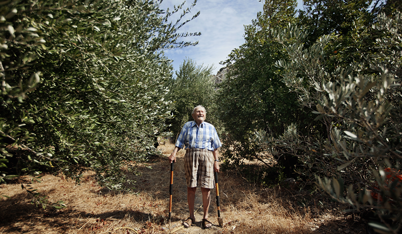 102-year-old Stamatis Moraitis looks after his olive trees on Ikaria